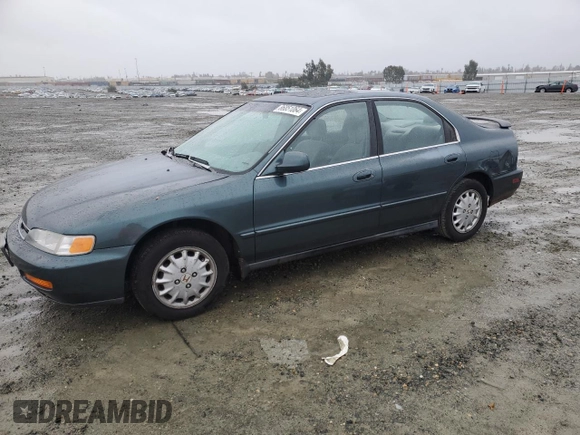 1996 Honda Accord EX with VIN 1HGCD5652TA206485, listed as a Copart auction lot 86851064 with 158,907 mi miles and Salvage Title. Bid and sale history available at DreamBid. Image 1.