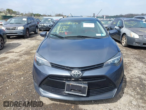 2019 Toyota Corolla L with VIN 2T1BURHEXKC161921, listed as a IAAI auction lot 42054835 with 41,172 mi miles. Bid and sale history available at carsss.com. Image 12.