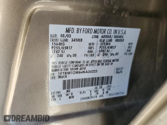2004 Ford F-150 XLT z VIN 1FTRW12W64KA34323, wystawiony jako Copart lot #65196405 z przebiegiem 170 724 mil mil oraz Szkoda całkowita • Salvage title. Historia ofert i sprzedaży dostępna na DreamBid. Obrazek 13.