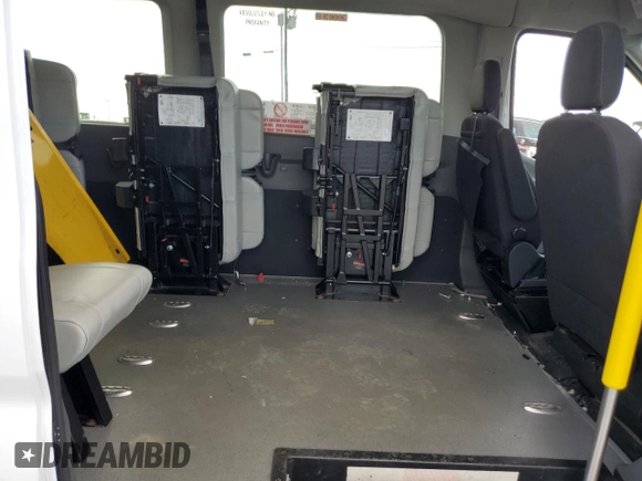 2021 Ford Transit with VIN 1FDAX2CG2MKA23709, listed as a Copart auction lot 74054214 with 105,503 mi miles and Salvage Title. Bid and sale history available at DreamBid. Image 11.