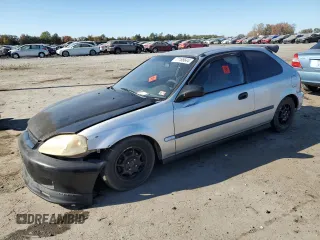 1998 Honda Civic CX with VIN 2HGEJ6325WH112575, listed as a Copart auction lot 77186644 with 147,976 mi miles and Salvage Title. Bid and sale history available at carsss.com. Image 1.