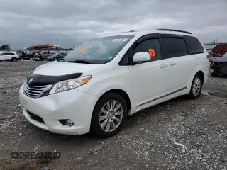 2011 Toyota Sienna XLE with VIN 5TDDK3DC7BS017072, listed as a Copart auction lot 54687525 with 128,385 mi miles and Salvage title. Bid and sale history available at DreamBid. Image 1.
