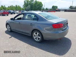 2013 Volkswagen Jetta TDI w/Premium with VIN 3VWLL7AJ2DM278015, listed as a IAAI auction lot 42619604 with 96,843 mi miles and . Bid and sale history available at DreamBid. Image 3.