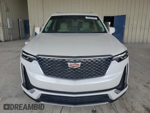 2023 Cadillac XT6 FWD Premium Luxury with VIN 1GYKPCRS4PZ103819, listed as a Copart auction lot 76279704 with 19,601 mi miles and Clean Title. Bid and sale history available at carsss.com. Image 5.