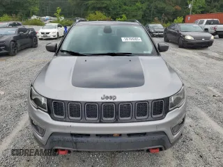 2018 Jeep Compass Trailhawk with VIN 3C4NJDDB4JT451409, listed as a Copart auction lot 58769305 with 135,562 mi miles and Clean title. Bid and sale history available at DreamBid. Image 5.