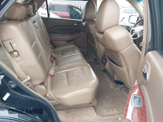 2005 Acura MDX Touring with VIN 2HNYD18945H514351, listed as a IAAI auction lot 41688097 with 323,000 mi miles. Bid and sale history available at carsss.com. Image 8.