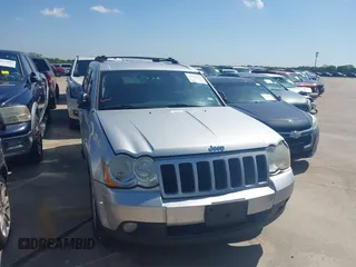 2010 Jeep Grand Cherokee Laredo with VIN 1J4PR4GK1AC143780, listed as a IAAI auction lot 42058575 with 88,608 mi miles. Bid and sale history available at carsss.com. Image 1.