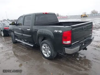 2013 GMC Sierra 1500 SLT with VIN 3GTP2WE70DG205210, listed as a IAAI auction lot 41107618 with 166,354 mi miles. Bid and sale history available at carsss.com. Image 3.