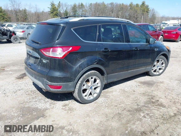 2014 Ford Escape Titanium with VIN 1FMCU9JX2EUA96338, listed as a IAAI auction lot 41806850 with 127,745 mi miles. Bid and sale history available at carsss.com. Image 4.