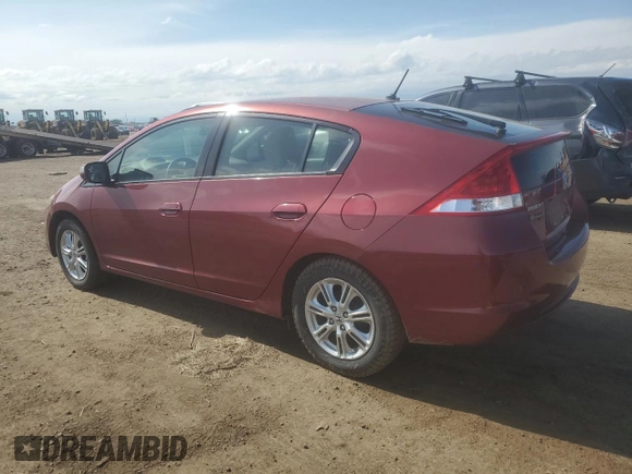 2010 Honda Insight EX with VIN JHMZE2H77AS025567, listed as a Copart auction lot 58499135 with 152,501 mi miles and Salvage title. Bid and sale history available at DreamBid. Image 2.