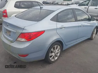 2013 Hyundai Accent GLS with VIN KMHCU4AE8DU583303, listed as a IAAI auction lot 42504235 with 113,992 mi miles and . Bid and sale history available at DreamBid. Image 4.