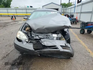 2005 Ford Taurus SE z VIN 1FAFP53U35A138592, wystawiony jako Copart lot #56176905 z przebiegiem Nie podano mil oraz Szkoda całkowita • Salvage title. Historia ofert i sprzedaży dostępna na DreamBid. Obrazek 5.