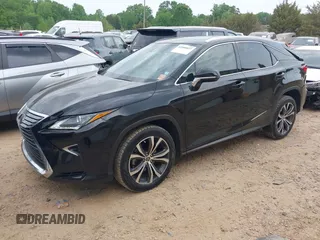2019 Lexus RX with VIN 2T2ZZMCA6KC150398, listed as a IAAI auction lot 42080027 with 68,598 mi miles. Bid and sale history available at carsss.com. Image 2.