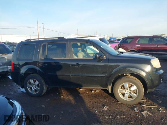 2009 Honda Pilot EX-L with VIN 5FNYF48659B012032, listed as a IAAI auction lot 41801232 with 205,636 mi miles and . Bid and sale history available at carsss.com. Image 13.