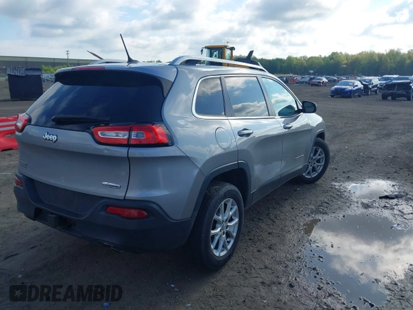 2014 Jeep Cherokee Latitude z VIN 1C4PJMCSXEW294950, wystawiony jako IAAI lot #42179152 z przebiegiem 105 796 mil mil oraz . Historia ofert i sprzedaży dostępna na DreamBid. Obrazek 4.