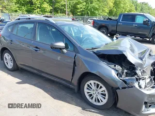 2018 Subaru Impreza Premium z VIN 4S3GTAD60J3705407, wystawiony jako IAAI lot #42109867 z przebiegiem 74 014 mil mil oraz . Historia ofert i sprzedaży dostępna na DreamBid. Obrazek 1.
