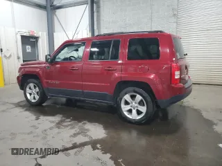 2014 Jeep Patriot Latitude with VIN 1C4NJRFB7ED855780, listed as a Copart auction lot 57246515 with 110,433 mi miles and Salvage title. Bid and sale history available at DreamBid. Image 2.