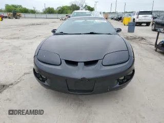 1999 Pontiac Firebird Firebird z VIN 2G2FS22K0X2226888, wystawiony jako Copart lot #51380795 z przebiegiem 137 800 mil mil oraz Tytuł czysty. Historia ofert i sprzedaży dostępna na DreamBid. Obrazek 5.