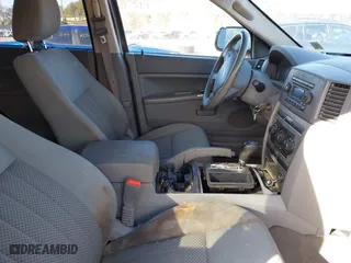 2006 Jeep Grand Cherokee Laredo with VIN 1J4GR48K16C142277, listed as a IAAI auction lot 41598878 with 169,236 mi miles. Bid and sale history available at carsss.com. Image 5.