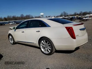 2013 Cadillac XTS Premium z VIN 2G61S5S34D9201773, wystawiony jako Copart lot #48572365 z przebiegiem 78 296 mil mil oraz Szkoda całkowita • Salvage title. Historia ofert i sprzedaży dostępna na DreamBid. Obrazek 2.