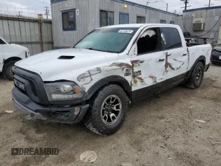 2018 Ram 1500 Rebel with VIN 1C6RR7YT7JS235965, listed as a Copart auction lot 84749674 with 61,484 mi miles and Salvage Title. Bid and sale history available at carsss.com. Image 1.