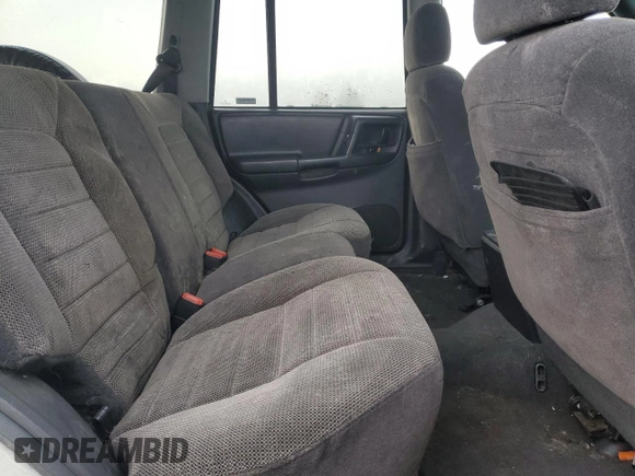 1998 Jeep Grand Cherokee Laredo with VIN 1J4GZ48S1WC165851, listed as a Copart auction lot 84110044 with 306,484 mi miles and Salvage Title. Bid and sale history available at carsss.com. Image 11.