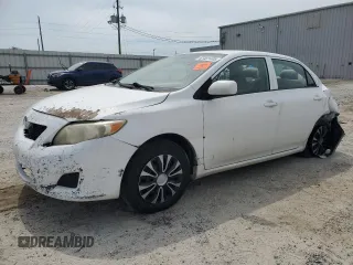2010 Toyota Corolla with VIN 1NXBU4EE6AZ267240, listed as a Copart auction lot 63481405 with 193,370 mi miles and Salvage title. Bid and sale history available at DreamBid. Image 1.