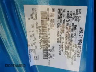 2007 Ford Focus S z VIN 1FAFP31N77W244856, wystawiony jako Copart lot #88972705 z przebiegiem Nie podano mil oraz Szkoda całkowita • Salvage title. Historia ofert i sprzedaży dostępna na DreamBid. Obrazek 14.