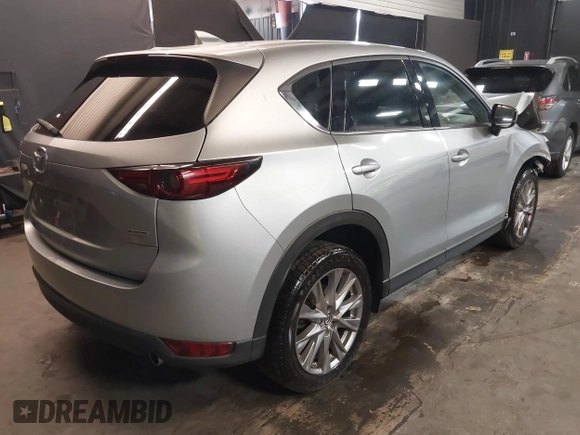 2019 Mazda CX-5 Grand Touring with VIN JM3KFBDM9K0621246, listed as a IAAI auction lot 42005391 with 45,687 mi miles. Bid and sale history available at carsss.com. Image 4.
