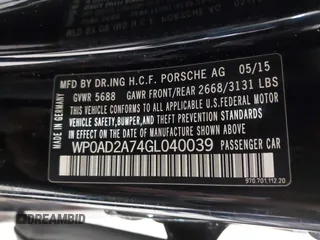 2016 Porsche Panamera S E-Hybrid z VIN WP0AD2A74GL040039, wystawiony jako IAAI lot #42411042 z przebiegiem 60 616 mil mil oraz . Historia ofert i sprzedaży dostępna na DreamBid. Obrazek 9.