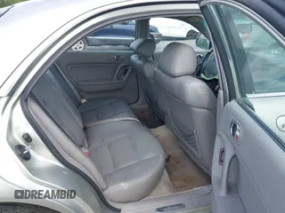 2002 Mazda Millenia with VIN JM1TA221721722364, listed as a IAAI auction lot 42160683 with 166,778 mi miles and . Bid and sale history available at DreamBid. Image 8.