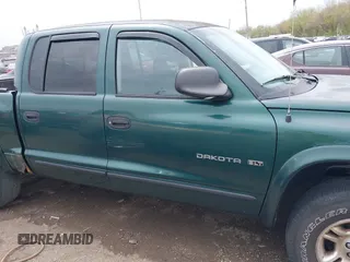 2001 Dodge Dakota Sport z VIN 1B7HG2ANX1S256902, wystawiony jako IAAI lot #42037703 z przebiegiem 121 914 mil mil oraz . Historia ofert i sprzedaży dostępna na DreamBid. Obrazek 13.