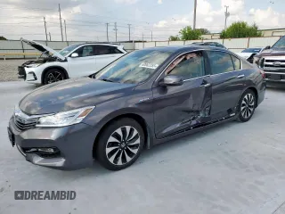 2017 Honda Accord Touring z VIN JHMCR6F79HC000923, wystawiony jako Copart lot #60062255 z przebiegiem 92 597 mil mil oraz Czysty tytuł • Clean title. Historia ofert i sprzedaży dostępna na DreamBid. Obrazek 1.