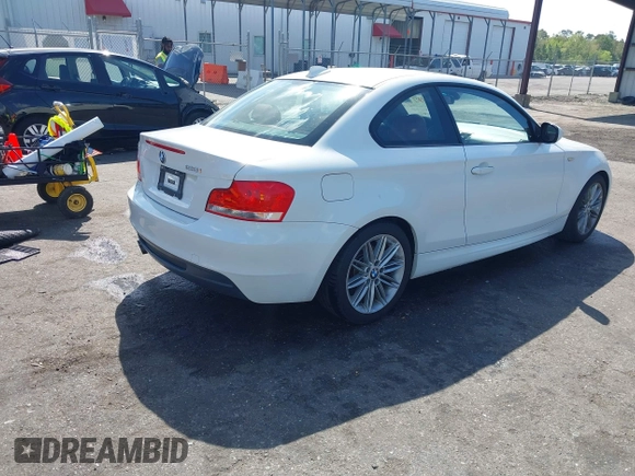 2013 BMW 1 Series 128i with VIN WBAUP7C50DVP24385, listed as a IAAI auction lot 41913737 with 46,217 mi miles and . Bid and sale history available at carsss.com. Image 4.