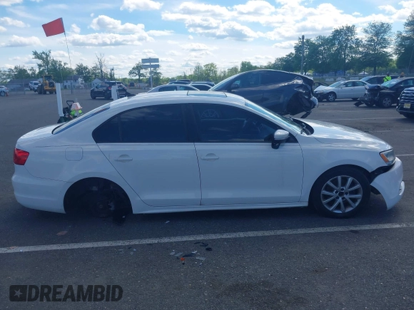 2012 Volkswagen Jetta SE z VIN 3VWDX7AJ7CM362001, wystawiony jako IAAI lot #42209146 z przebiegiem 200 566 mil mil oraz . Historia ofert i sprzedaży dostępna na DreamBid. Obrazek 14.