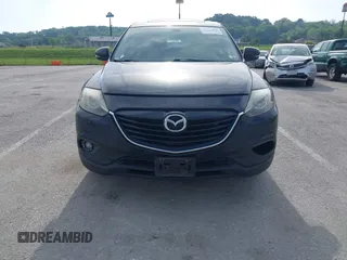 2015 Mazda CX-9 Grand Touring z VIN JM3TB2DA1F0456773, wystawiony jako IAAI lot #42257555 z przebiegiem 152 890 mil mil oraz . Historia ofert i sprzedaży dostępna na DreamBid. Obrazek 12.