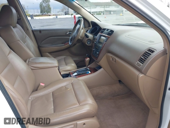 2004 Acura MDX Touring Pkg w/Navigation with VIN 2HNYD18834H520180, listed as a IAAI auction lot 41934124 with 201,817 mi miles. Bid and sale history available at carsss.com. Image 5.