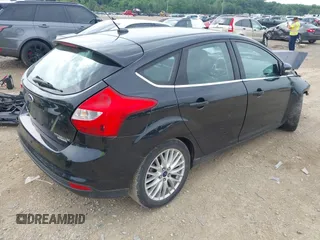 2014 Ford Focus Titanium with VIN 1FADP3N25EL194433, listed as a IAAI auction lot 42512912 with 105,355 mi miles and . Bid and sale history available at DreamBid. Image 4.