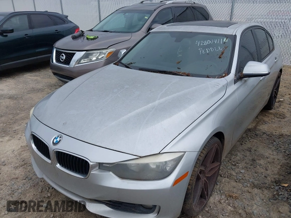 2014 BMW 3 Series 328i with VIN WBA3A5G52ENP31318, listed as a IAAI auction lot 42801411 with 149,355 mi miles and . Bid and sale history available at DreamBid. Image 18.