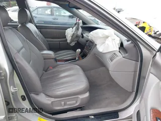 2004 Toyota Avalon XL with VIN 4T1BF28B44U364702, listed as a IAAI auction lot 41473272 with 226,845 mi miles. Bid and sale history available at carsss.com. Image 5.