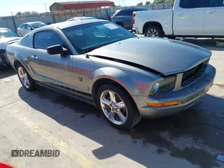 2009 Ford Mustang with VIN 1ZVHT80N595134732, listed as a IAAI auction lot 40931192 with 145,401 mi miles and . Bid and sale history available at carsss.com. Image 1.
