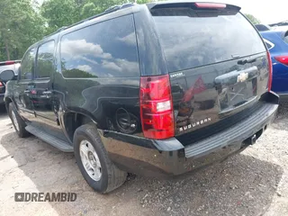 2010 Chevrolet Suburban LT with VIN 1GNUCJE06AR138587, listed as a IAAI auction lot 42145484 with 283,318 mi miles and . Bid and sale history available at DreamBid. Image 3.