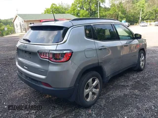 2018 Jeep Compass Latitude with VIN 3C4NJDBB8JT434339, listed as a IAAI auction lot 42404248 with 131,295 mi miles and . Bid and sale history available at DreamBid. Image 4.