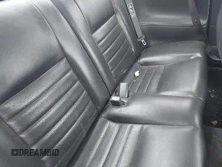 2002 Ford Mustang GT Deluxe z VIN 1FAFP42X82F158373, wystawiony jako IAAI lot #42299510 z przebiegiem 178 657 mil mil oraz . Historia ofert i sprzedaży dostępna na DreamBid. Obrazek 8.