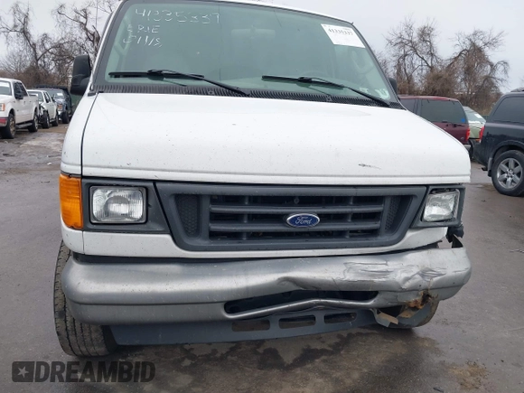 2005 Ford Econoline Cargo with VIN 1FTNE24W95HB25640, listed as a IAAI auction lot 41335337 with 183,045 mi miles. Bid and sale history available at carsss.com. Image 13.