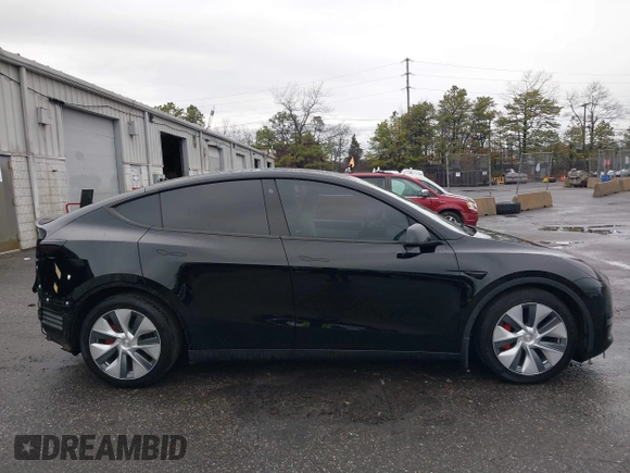 2022 Tesla Model Y Performance with VIN 7SAYGDEF7NF403701, listed as a IAAI auction lot 41961532 with 83,728 mi miles and . Bid and sale history available at DreamBid. Image 14.