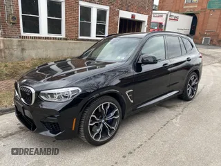 2021 BMW X3 M with VIN 5YMTS0C05M9G46973, listed as a IAAI auction lot 41334083 with 42,819 mi miles. Bid and sale history available at carsss.com. Image 1.