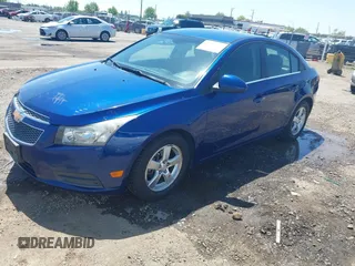 2013 Chevrolet Cruze 1LT with VIN 1G1PC5SB1D7248233, listed as a IAAI auction lot 42150409 with 151,307 mi miles and . Bid and sale history available at DreamBid. Image 2.