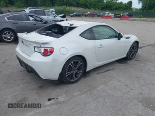 2013 Subaru BRZ Limited with VIN JF1ZCAC18D1610243, listed as a IAAI auction lot 42372354 with 40,185 mi miles and . Bid and sale history available at DreamBid. Image 4.