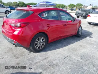 2015 Mazda 3 i Touring with VIN 3MZBM1L76FM203277, listed as a IAAI auction lot 41943139 with 102,056 mi miles and . Bid and sale history available at carsss.com. Image 4.
